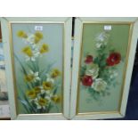 A pair of framed paintings on glass depicting flowers. 14 1/2" x 26 1/2".