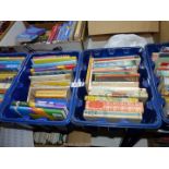 Four boxes of books: children's books, Driving Test Theory,