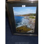 A framed and mounted enlarged photograph depicting Pobbles Bay and Three Cliffs Bay from Pennard.