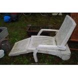 White plastic garden lounger