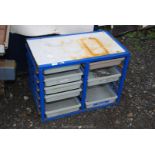 A 12 tray/drawer school cabinet, only 8 trays present.