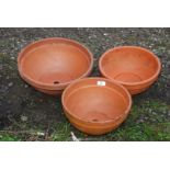 Three Terracotta bulb planters,