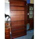 A contemporary Mahogany floorstanding Bookshelves having height adjustable and two fixed shelves