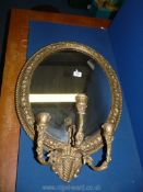An ornate gilt framed Girandole Mirror with candle holders,