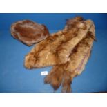 A Mink stole and hat.