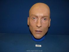 A stunt mask for Jeremy Irons used in The Watchmen.