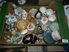 A quantity of china ornaments, pin dishes etc.