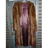 A fur Coat in honey shades with Peter Pan collar, lining a/f, size M/L.