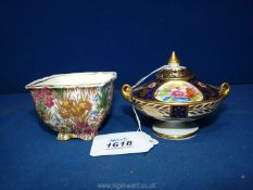 A Crown Staffordshire Grecian shaped urn with hand painted reserves of flowers and cobalt blue with