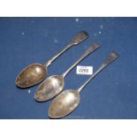 Three silver serving spoons including; London silver (possibly 1839) by Samuel & Dudley Carter,