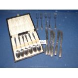 Six silver handled butter knives, five epns pastry forks and a cased set of epns teaspoons.