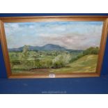 An oil on board of a view of The Malvern Hills.