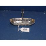 A silver Bonbon basket with pierced gallery and handle in boat shape, 5'' long, Birmingham 1921,