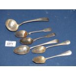 A quantity of silver dessert spoons to include; 1825 London maker C.