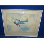 A framed and mounted Watercolour of torpedo-carrying Biplanes (Fairey Swordfish) aloft above the