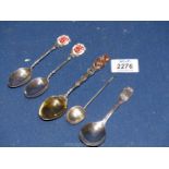 Three Silver collectors Spoons, Birmingham 1928, '33 and '35, a silver coffee bean spoon,