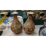 A pair of Satsuma style vases