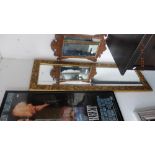 A gilt framed mirror