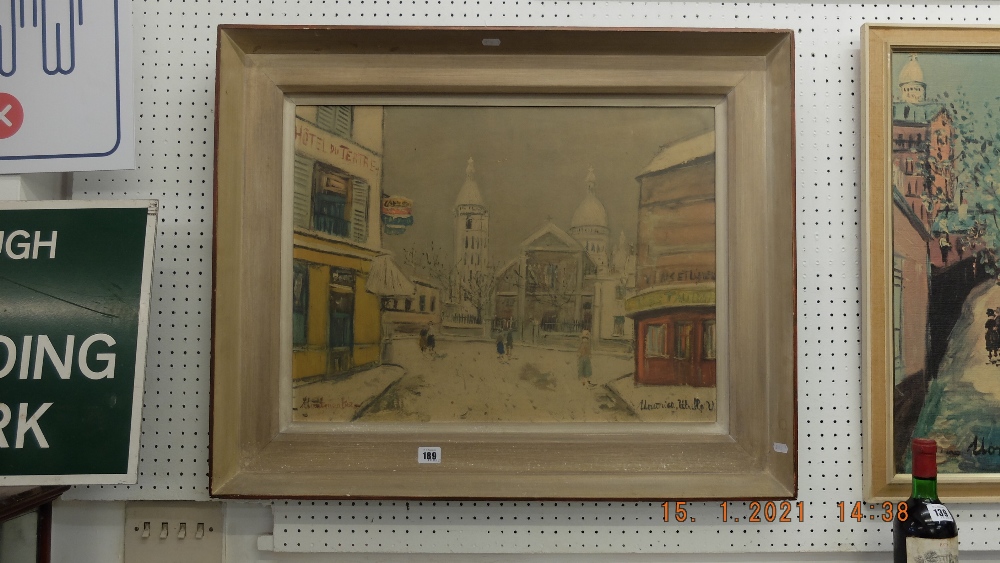 A framed lithograph, French Street scene,