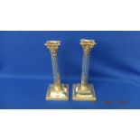 A pair of hallmarked silver candlesticks