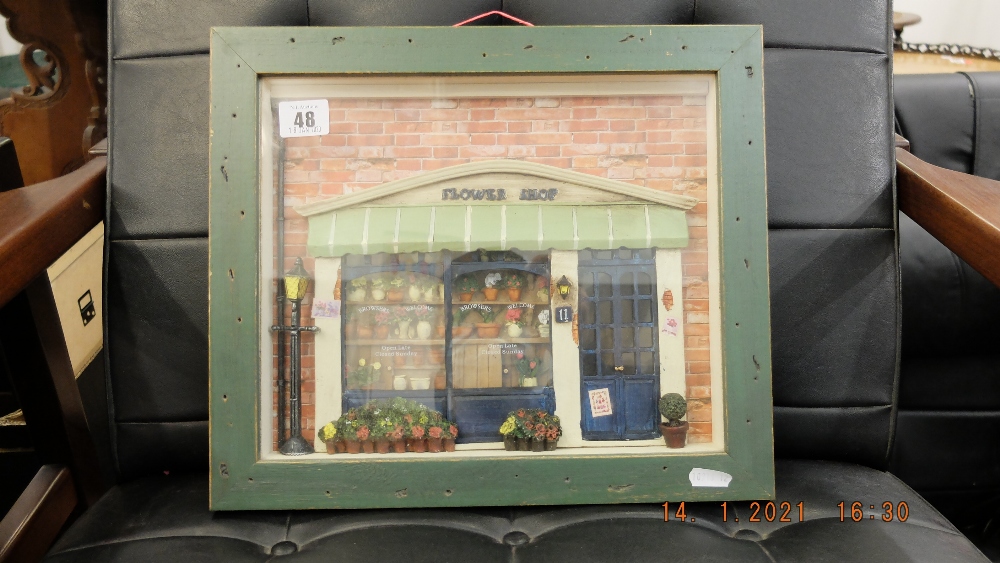 A framed model flower shop