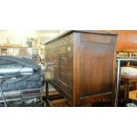 An oak two door cupboard