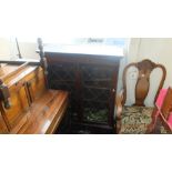 Glass fronted bookcase, with key a.