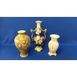An oriental vase and a two handled vase plus another