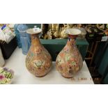 A pair of Satsuma style vases