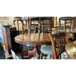 A 19th century mahogany table and four chairs