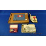 A collection of war memorabilia; OBE medal, Coronation medal, photographs inc Rommel and Montgomery,