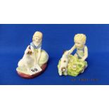 A pair of Royal Doulton figures