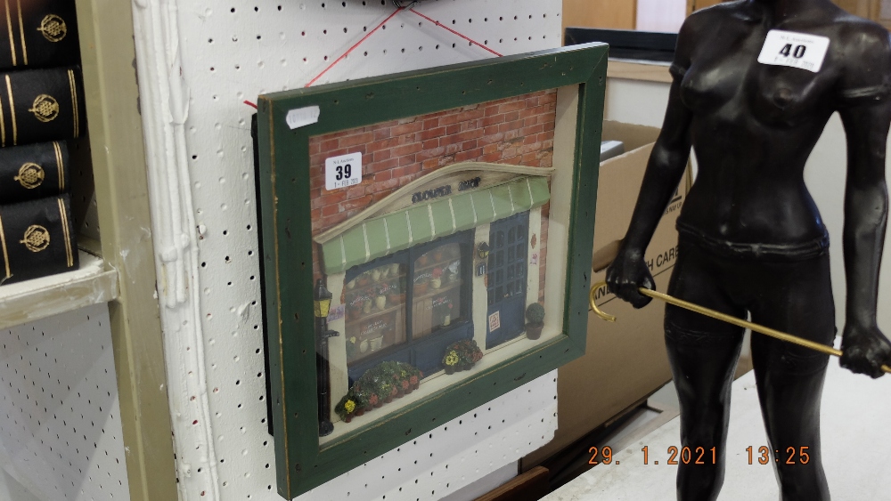 A framed model flower shop