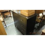 A black chest of drawers