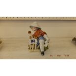 A German cricket figurine, Parian a.