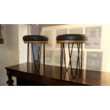 Four contemporary stools, two long,