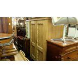 A 19th century pine double wardrobe.