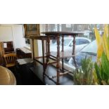 A two tier Walnut occasional table plus another