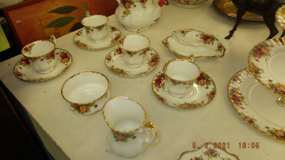 A Royal Albert tea set, thirty-three pieces inc. teapot, sugar bowl, cake stand and milk jug etc. - Image 4 of 5