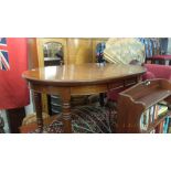 A Victorian mahogany dining/ breakfast table