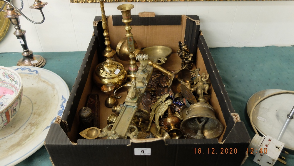 A collection of brass religious items