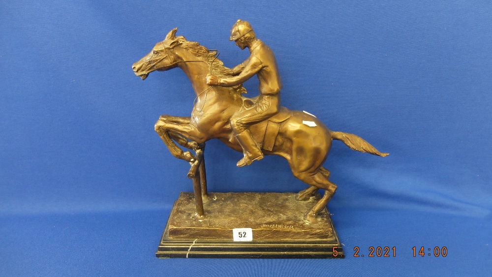 A bronze Racehorse/ Jockey statue,