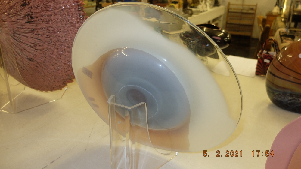 A pink/ white studio glass charger, signed Shaun Weisbach,