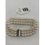 A three row cultured pearl bracelet, 7mm pearl,