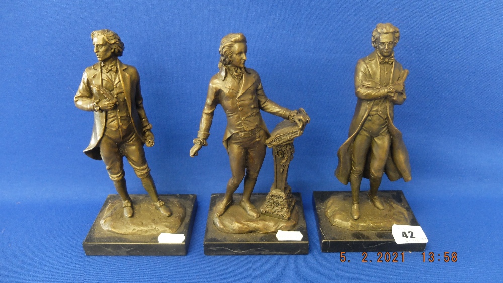 A bronze set of three Composers