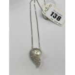 A 9ct white gold diamond pearl set pendant on chain