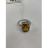 An 18ct white gold, Citrine and diamond ring, approx.