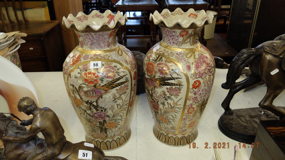 A pair of Satsuma style vases