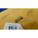 A ladies seven stone half eternity ring, mounted in 18ct Gold,