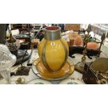 A yellow eastern style bowl and a vase